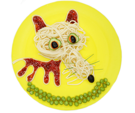 creative vegetable food meal with spaghetti and sausage wolf formの写真素材