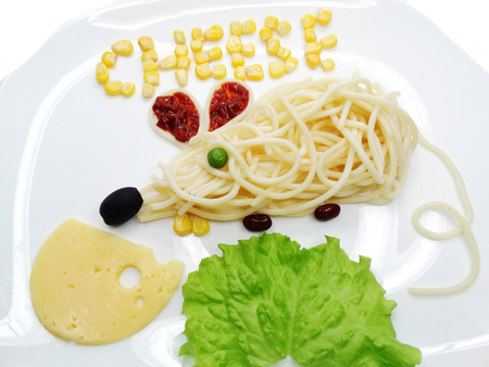 creative vegetable food meal with spaghetti mouse formの写真素材