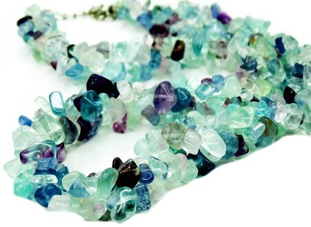 fluorite gemstone beads isolated on white backgroundの写真素材