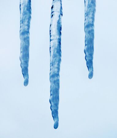 icicle on snow winter background christmas cardの写真素材