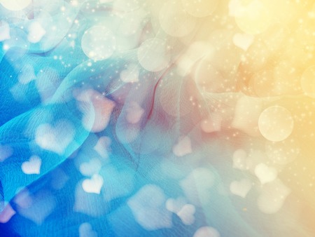 abstract background love colorful red blurs with shiny hearts
