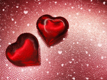 greeting card love valentine's day with hearts on shiny red background and copy spaceの写真素材