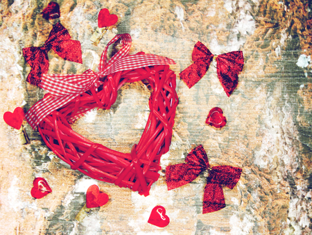 greeting card love valentine's day with hearts on vintage wooden background の写真素材