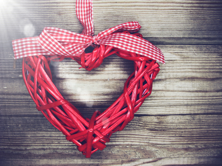 greeting card love valentine's day with hearts on vintage wooden background and copy spaceの写真素材