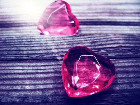 crystal gem two ruby hearts love valentine's day on vintage wooden backgroundの写真素材