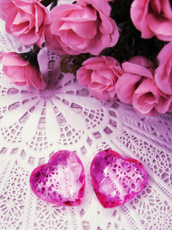 crystal gem two ruby hearts and roses flowers love valentine's day backgroundの写真素材