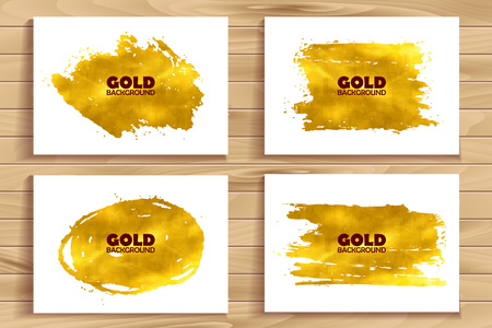 Set of golden glitter spots with halftone effect. Golden sparkling brush strokes isolated on white background.のイラスト素材