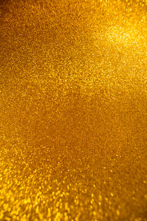 Abstract gold shiny blurred backgroundの写真素材