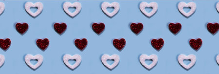 Banner. Red and white hearts pattern on blue background.