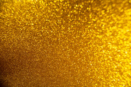 Abstract gold shiny blurred backgroundの写真素材