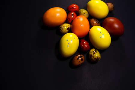 Easter eggs on black background. Copy spaceの写真素材