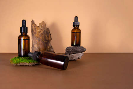 Cosmetic product with moss, stones and tree bark decor.の写真素材