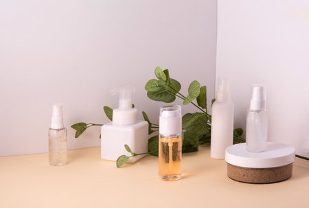 Cosmetic containers and skin care products on light backgroundの写真素材