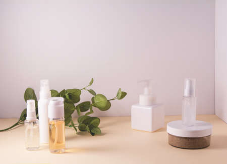 Cosmetic containers and skin care products on light backgroundの写真素材