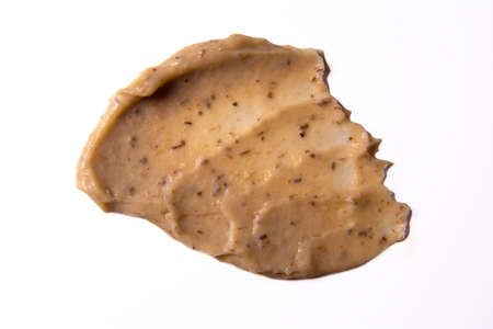 Skin scrub smear on isolated background. Cosmetic product. Cleansing and exfoliating your skinの写真素材