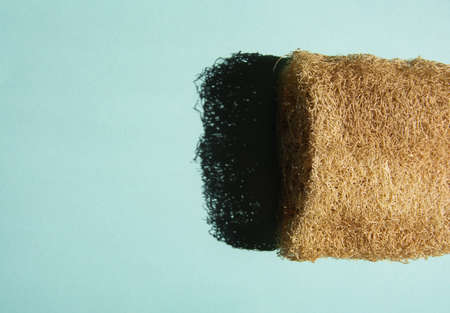 Natural sponge from loofah on a blue background