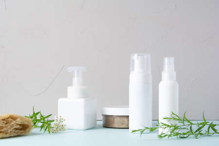 Cosmetic bottle with gel and a scrub to cleanse the skin, spa and aromatherapy. Beauty and wellness conceptの写真素材