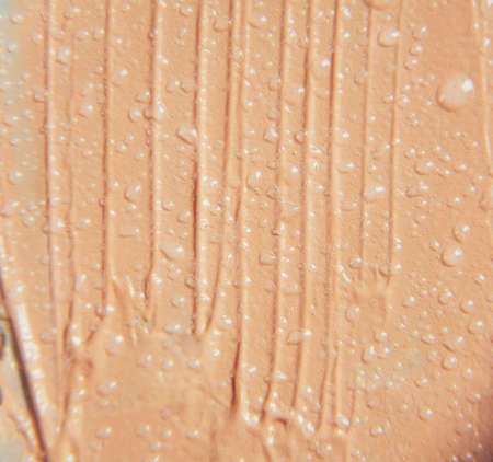 The texture of the foundation is beige under the make-upの写真素材