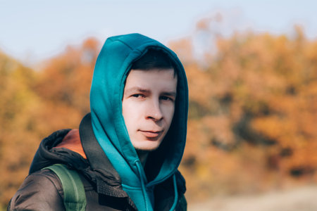 Portrait of smiling adult man outdoors, copy spaceの写真素材