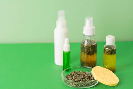 Fermented beauty products with green tea extract, holistic beauty concept, copy spaceの写真素材