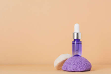 Beauty, spa and wellness concept. Facial cosmetic product, konjac sponge on beige background. Health and medicine concept, beauty and selfcare. Front view, copy spaceの写真素材