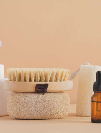 Spa cosmetic products and eco friendly bathroom accessories on a beige background. Beauty, spa and...