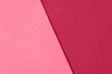 Close up pink and red felt texture. Textured fabric backdrop. color block. Color of the Year 2023の写真素材