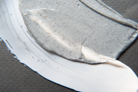 Close-up smear of creamy cosmetic and product with particlesの写真素材
