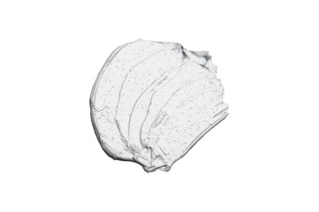 Skin scrub smear on an isolated background. Texture of skin care cosmetic productの写真素材