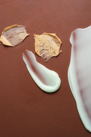 Swatches of cosmetic products for the face and body. Texture of skin care cosmetic product. Verticalの写真素材