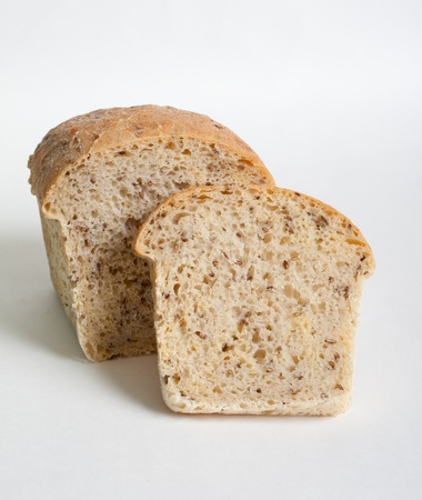 Home bread with linseed on the light grey background の写真素材
