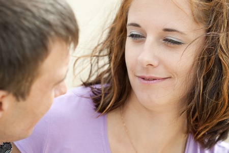 beautiful woman is looking at her boyfriendの写真素材