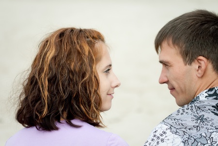 Man and woman looking at each otherの写真素材