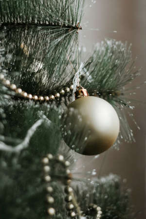 Christmas tree. Christmas tree with New Year's toys. Illuminated on the Christmas tree.の写真素材