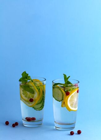 Sassy diet water. Cucumber, lemon, mint beverage in glassesの写真素材