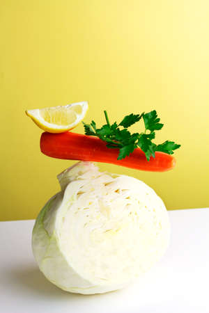 Balancing concept salad from cabbage and carrotの写真素材