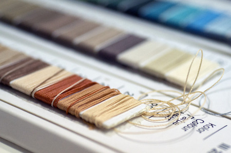 Catalogue of threads. Multicolored furniture threads.の写真素材