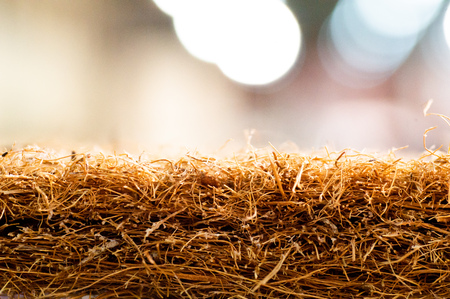 Coconut coir. Grated coconut shell for the production of mattresses. texture, natural background. Coconut coir pressed at the factory. Background of coconut fiber.の写真素材