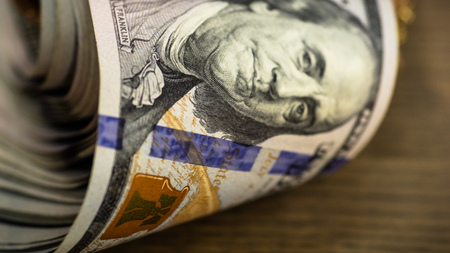 Macro shot of a 100 dollar. Dollars Closeup Concept. American Dollars Cash Money. One Hundred Dollar...