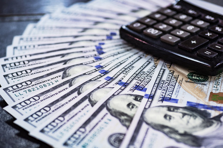 Macro shot of a 100 dollar. Dollars Closeup Concept. American Dollars Cash Money. One Hundred Dollar Banknotes. Hundred Bucks. Benjamin Franklin's portrait.の写真素材