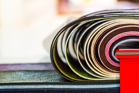 Catalog of multicolored imitation leather from matting fabric texture background, leatherette fabric...