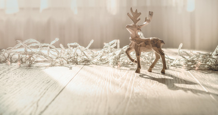 Merry Christmas Card with christmas deerchristmas decorations over grunge background.の写真素材