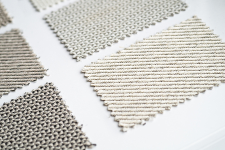 Catalog of multicolored cloth from matting fabric texture background, silk fabric texture, textile industry background.の写真素材