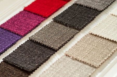 Catalog of multicolored cloth from matting fabric texture background, silk fabric texture, textile industry background.の写真素材