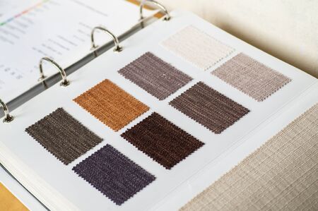 Catalog of multicolored cloth from matting fabric texture background, silk fabric texture, textile industry background.の写真素材
