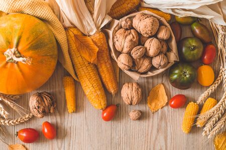 Harvest, Autumn. Still life with Thanksgiving concept. Panoramic collection of fresh healthy fruits and vegetables. Healthy eating background. Vegetables on vintage rustic wooden background.の写真素材