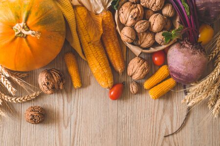 Harvest, Autumn. Still life with Thanksgiving concept. Panoramic collection of fresh healthy fruits and vegetables. Healthy eating background. Vegetables on vintage rustic wooden background.の写真素材