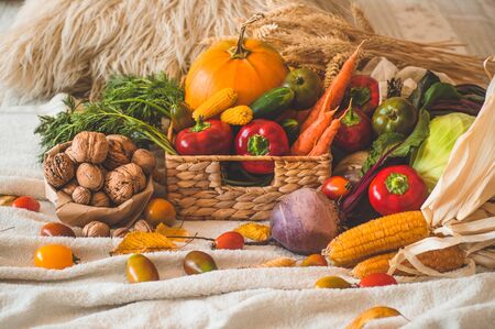 Harvest, Autumn. Still life with Thanksgiving concept. Panoramic collection of fresh healthy fruits and vegetables. Healthy eating background. Vegetables on vintage rustic wooden background.の写真素材