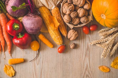 Harvest, Autumn. Still life with Thanksgiving concept. Panoramic collection of fresh healthy fruits and vegetables. Healthy eating background. Vegetables on vintage rustic wooden background.の写真素材