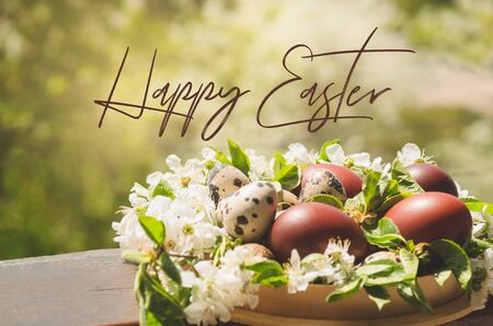 Happy Easter. Congratulatory easter background. Easter cake with easter eggs on a wooden window...